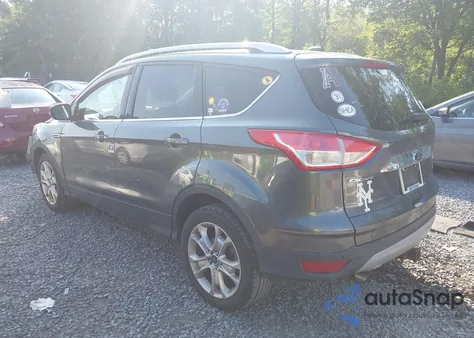 2016 Ford Escape Titanium z USA, uszkodzony, nr VIN 1FMCU9J94GUB85476